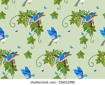 Birds fly over the bunches of grapes. Floral seamless pattern with birds, butterflies and fruit.