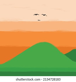 birds fly over the hills