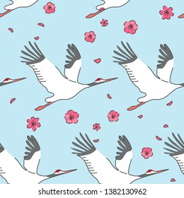 Birds flying. Pattern. Sakura flowers. Stork
