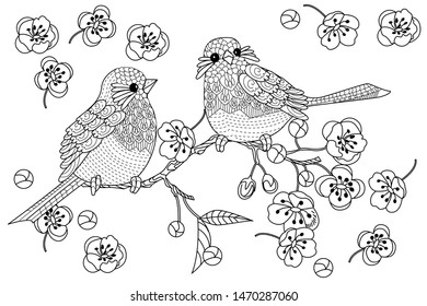 Birds hand drawn in vintage style with flowers. Spring birds sitting on blossom branches of cherry. Linear engraved art. Bird concept. Romantic concept. Vector design