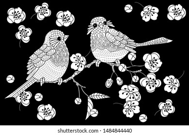 Birds hand drawn in vintage style with flowers. Spring birds sitting on blossom branches of cherry. Linear engraved art. Bird concept. Romantic concept. Vector design