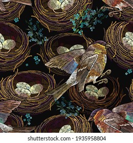 Birds, meadow herbs and bird nest with eggs. Embroidery design. Template for design of clothes, tapestry. Fashion spring garden style. Happy easter art. Seamless pattern 