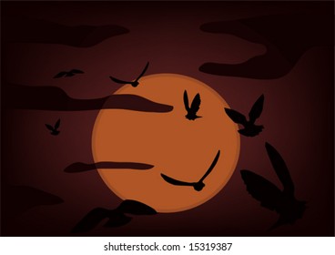 Birds on a background an ascending sun
