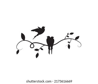 Birds on branch and flying bird silhouette, vector. Wall decals, birds on tree design. Birds in love. Nature art design. Wall decor isolated on white background