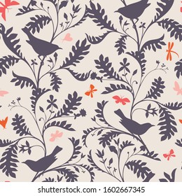 Birds on the tree branches. Seamless pattern. Animal silhouettes in vintage style. Nature motif with small birds, boughs with leaves. Textile fashion design for fabric and wrapping.