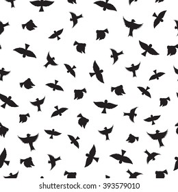 Birds seamless pattern. Black silhouettes. A simple outline. White background. Vector illustration