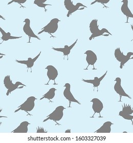 Birds. Seamless vector pattern image. Blue background.