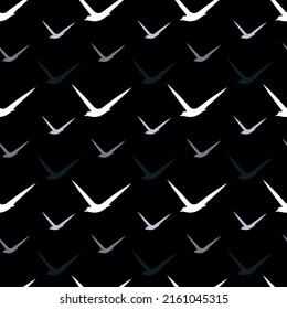 birds silhouette in sky seamless pattern, black background