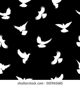 Birds silhouettes - flying seamless pattern. Black and white.