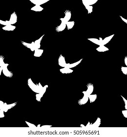 Birds silhouettes - flying seamless pattern. Black and white.