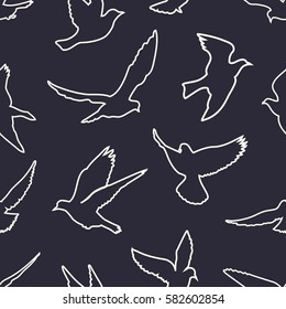 Birds silhouettes - flying seamless pattern