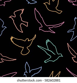 Birds silhouettes - flying seamless pattern