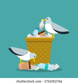 Birds sit on a trash can and look for food in it. Seagulls dig in the trash and eat waste. Garbage - food for wild birds. Vector illustration, flat design, cartoon style, isolated blue background.