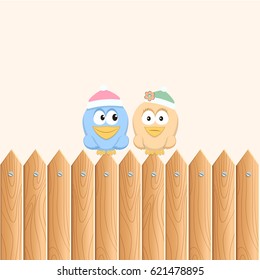 birds sitting on the wooden fence