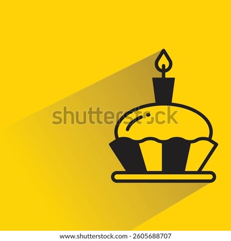 birthday cake with shadow on yellow background