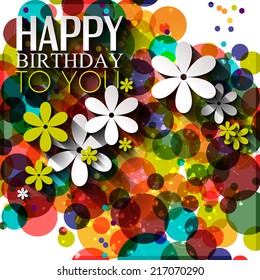 Birthday card in bright colors on polka dots background.