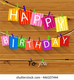 Birthday card with Clothespin and colorful letters hang on rope