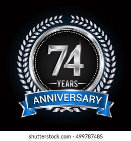 Birthday celebration logo 74 years with wreath, laurel, blue ribbon and silver ring