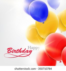 Birthday greeting card with blue, yellow and red balloons.