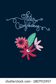 Birthday greeting card design. Text in Spanish says happy birthday. Minimalistic floral bouquet and hand lettering. Isolated on dark blue