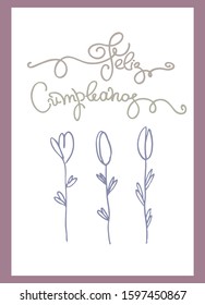 Birthday greeting card in Spanish language. Text says Happy Birthday. Hand lettering and flowers in lilac color frame on white background