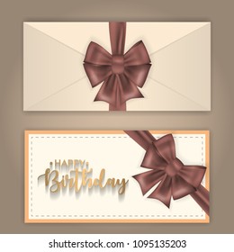 Birthday greeting envelope decorated with bow and ribbon