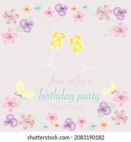 Birthday greetings card with floral background and two champagne glasses.