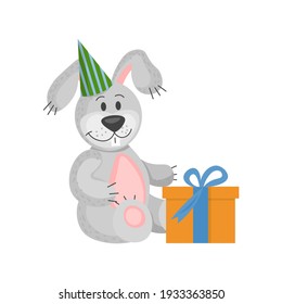 birthday of the hare. The rabbit is sitting with a gift and a cap on its head. Vector illustration in flat style. 