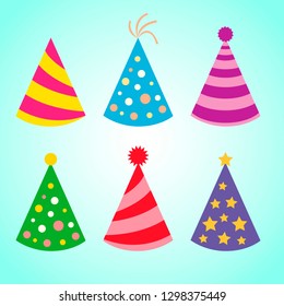 Birthday hats. Birthday caps. Colored holiday hats isolated on blue bacground. VEctor set for  events decoration.