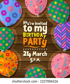 Birthday party invitation card with patterned flat balloons on wooden background. Vector.
