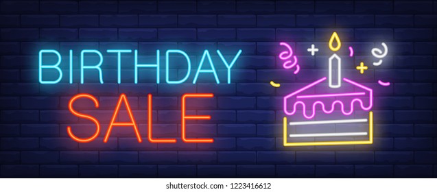 Birthday sale neon sign. Peace of cake with burning candle and streamers on brick wall background. Vector illustration in neon style for retail banners, special offers, promotion