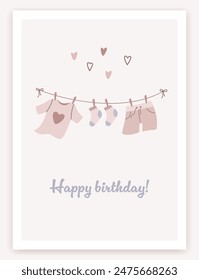 Сute birthday trendy greeting card in flat design. Illustration of baby clothes on a clothesline. Сhildren's magic party poster, banner or invitation. Cartoon design. Vector illustration.
