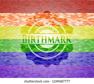 Birthmark emblem on mosaic background with the colors of the LGBT flag