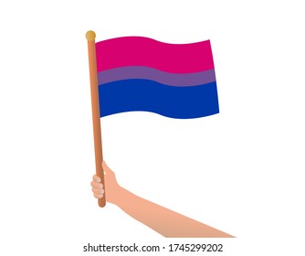 Bandera bisexual en mano. El brazo sostiene la bandera simboliza la atracción bisexual hacia ambos géneros, los elementos del diseño. Ilustración plana. Ilustración vectorial en un fondo aislado blanco.
