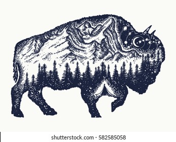 Bison tattoo art. Buffalo bull travel symbol, adventure tourism. Mountain, forest, night sky. Magic tribal bison, double exposure animals