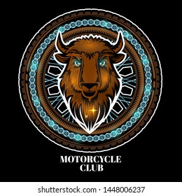 Bison's head in center of motorcycle wheel, color label on black background