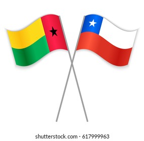 Bissau-Guinean and Chilean crossed flags. Guinea-Bissau combined with Chile isolated on white. Language learning, international business or travel concept.