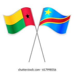 Bissau-Guinean and Congolese crossed flags. Guinea-Bissau combined with Democratic Republic of the Congo isolated on white. Language learning, international business or travel concept.