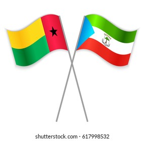 Bissau-Guinean and Equatorial Guinean crossed flags. Guinea-Bissau combined with Equatorial Guinea isolated on white. Language learning, international business or travel concept.