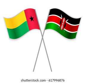 Bissau-Guinean and Kenyan crossed flags. Guinea-Bissau combined with Kenya isolated on white. Language learning, international business or travel concept.