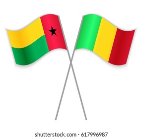 Bissau-Guinean and Malian crossed flags. Guinea-Bissau combined with Mali isolated on white. Language learning, international business or travel concept.