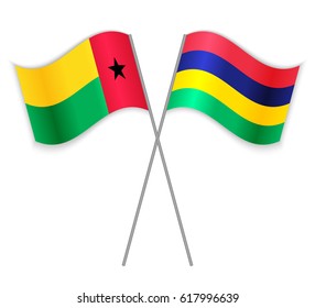 Bissau-Guinean and Mauritian crossed flags. Guinea-Bissau combined with Mauritius isolated on white. Language learning, international business or travel concept.