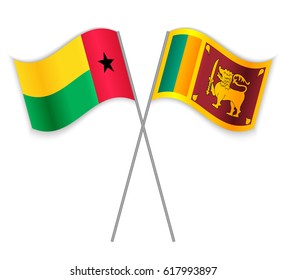 Bissau-Guinean and Sri Lankan crossed flags. Guinea-Bissau combined with Sri Lanka isolated on white. Language learning, international business or travel concept.