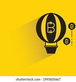 bitcoin balloon icon with shadow on yellow background