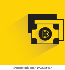 bitcoin bank with shadow on yellow background