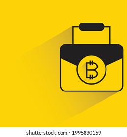 bitcoin briefcase with shadow on yellow background