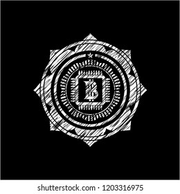 bitcoin chip (cryptocurrency mining concept) icon inside chalkboard emblem written on a blackboard