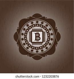 bitcoin chip (cryptocurrency mining concept) icon inside wood emblem. Vintage.