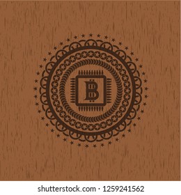 bitcoin chip (cryptocurrency mining concept) icon inside wood emblem