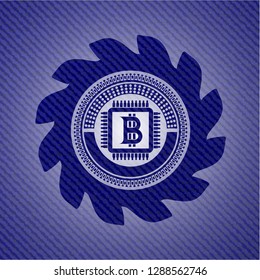 bitcoin chip (cryptocurrency mining concept) icon inside emblem with denim high quality background